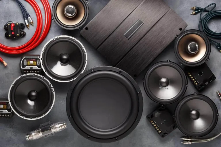 View of brown car speakers with visible cables
